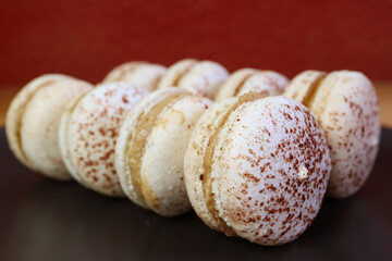Closeup of Rows of Mouthwatering Tiramisu Macarons