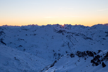 Sunset over an alpine ridge in the French Alps