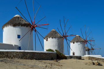 Landscape with windmills and blue sky in Myconos