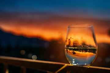Glass of White Wine in front of Sunset