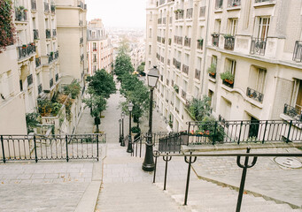 stairs and ornate lampposts leading to Montmartre
