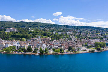 Fototapeta na wymiar Aerial view of Evian (Evian-Les-Bains) city in Haute-Savoie in France