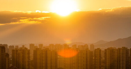 Obraz premium Background of city buildings at sunset