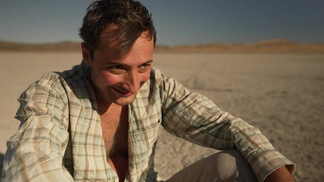 A man in the desert sees a mirage