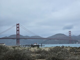 View of Golden gate bridge in San Francisco California from the shoreline of the bay