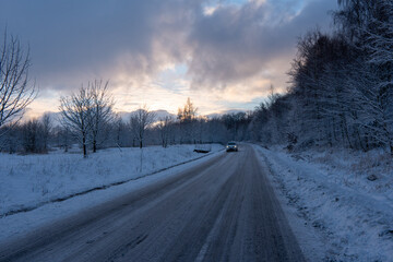 Fototapeta na wymiar winter road and snow with landscape of trees with frost