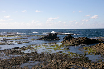 Fototapeta na wymiar Coastline formed by volcanic activity in Ogi coast in Sado Island, Niigata prefecture, Japan.