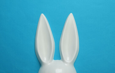 Bunny ears sex shop mask on blue background