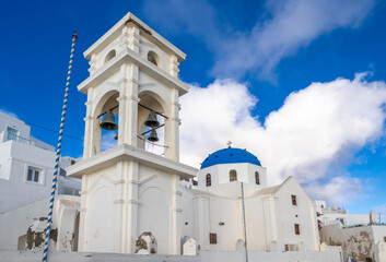 Typical orthodox greek church in Santorini (officially Thira and Classical Greek Thera) island, Cyclades islands, Aegean Sea, Greece - obrazy, fototapety, plakaty