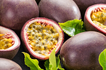 Ripe passion fruits with passion fruit seeds .