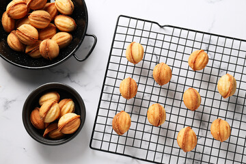 Cookies Nuts in a bowl with a baking grid