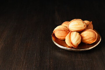 Cookies Nuts in a bowl on a dark background