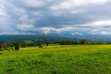 Fototapeta na wymiar Dark clouds and rain storm over the rice field, rainy season in Tatras mountain poland