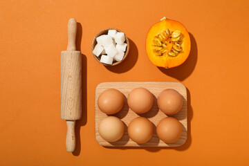 The ingredients are laid out on the table for preparing autumn pastries.