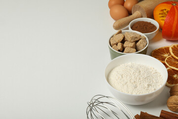The ingredients are laid out on the table for preparing autumn pastries.