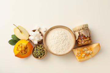 The ingredients are laid out on the table for preparing autumn pastries.