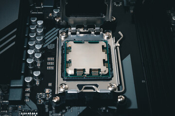 Computer processor from 2023 - CPU sitting in a motherboard on a gaming computer