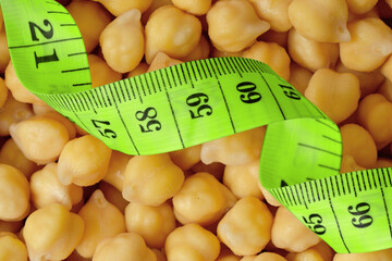 Chickpeas with tape measure - Concept of nutrition and diet