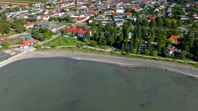 Flying On Coastal Road And Town In Neusiedler See, Burgenland, Austria. Aerial Drone Shot