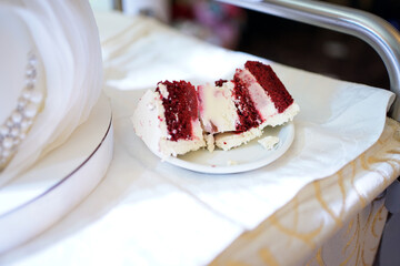 A piece of wedding cake on a plate. Wedding traditions.