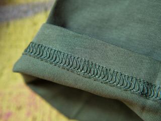 seams on the sleeve of a large T-shirt