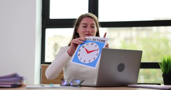 Manager puts up will returns sign and leaves workplace in office