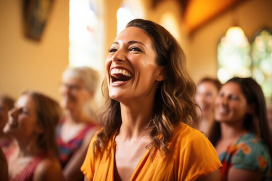 A happy laughing woman in a church. Warm and welcoming atmosphere.