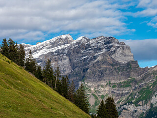 Summer travel to the Swiss Alps. Sun, warm beautiful weather, relaxation and travel. - 679624516