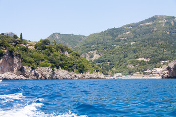 Fototapeta premium Mediterranean sea shore with mountains, Corfu