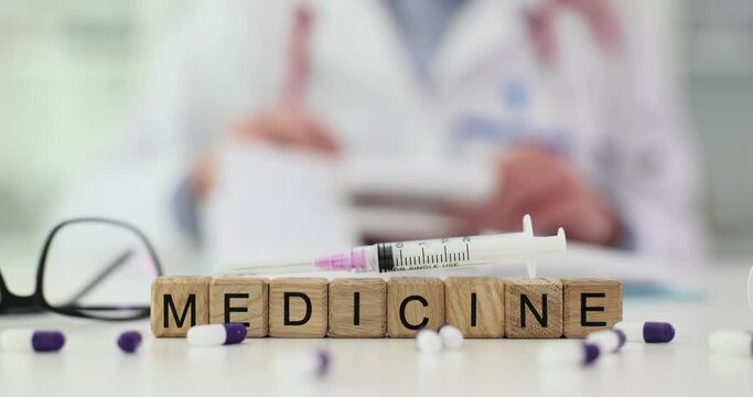 Word medicine syringe and medical pills in clinic treating diseases