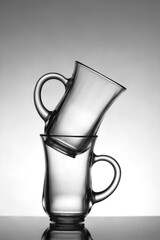 Glasses for tea on a black and white background..Empty glasses are on the table. Black and white.