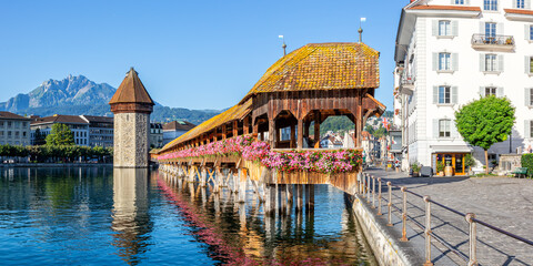 Lucerne city at Reuss river with Kapellbrücke and Pilatus mountain panorama in Switzerland - obrazy, fototapety, plakaty