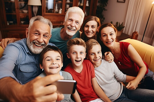 Family gathered together making a selfie photo in the living room.