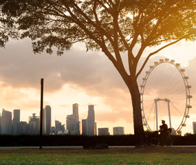 Tourists in the city park of singapore at night, landscape marina bay in Singapore city.