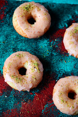 VANILLA DOUGHNUTS WITH BLOOD ORANGE GLAZ. top view