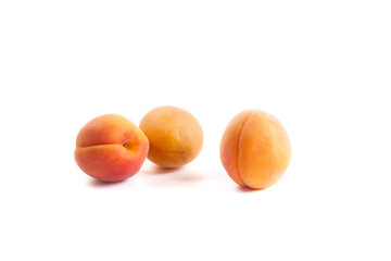 Apricots isolated on white background..