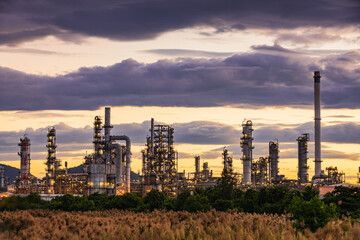 Oil​ refinery​ plant and tower of Petrochemistry industry in oil​ and​ gas​ ​industry with​ cloud​ blue​ ​sky