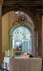 View of chapel and humble altar inside catholic church in Italy