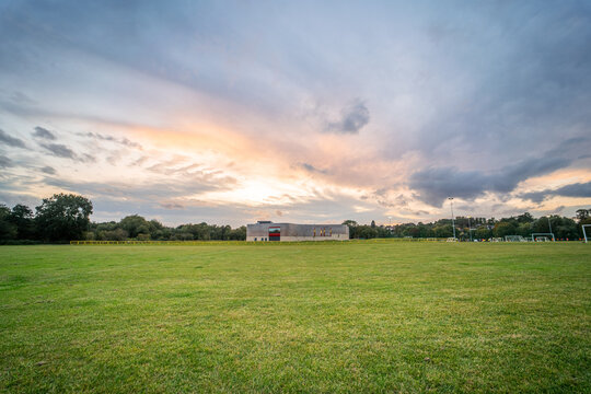 Large empty camping area in England during sunset