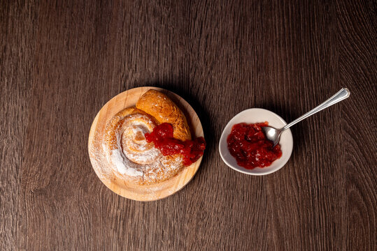 Breakfast with snack with ensaimada and jam