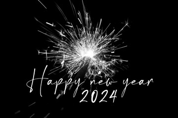 Happy new year 2024 black white sparkler years eve countdown. Luxury entertainment celebration turn of the year party time. Premium nightlife visual with glowing light sparks on dark background - 679668575
