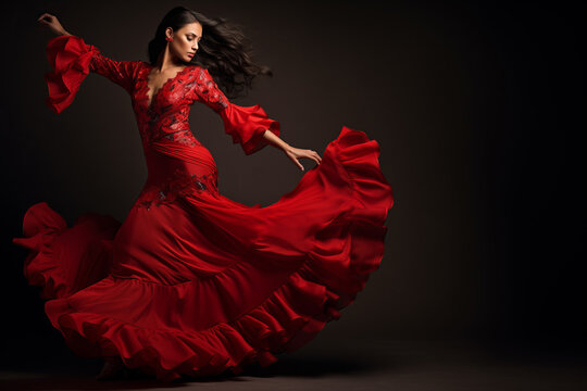 Young woman dancing flamenco on dark background in studio - Powered by Adobe