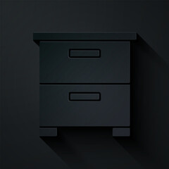 Paper cut Furniture nightstand icon isolated on black background. Paper art style. Vector