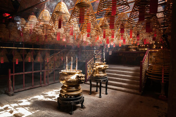 Burning incense coils inside Man Mo Temple, Sheung Wan, Hong Kong