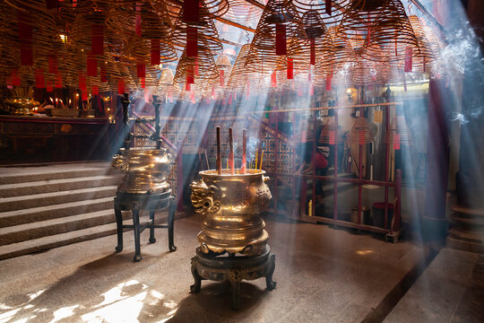 Burning incense coils inside Man Mo Temple, Sheung Wan, Hong Kong