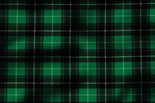 St. Patrick's Day tartan plaid. Scottish pattern in green and black cage. Scottish cage.