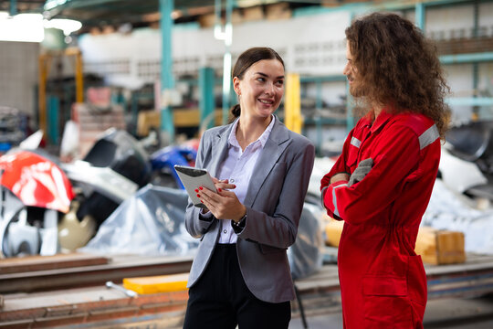  Motor insurance. caucasian man hispanic Accident Inspector Inspect damage car caused by car crash on the road with female customer. Car insurance agent examining car by Claim form clipboard in garage