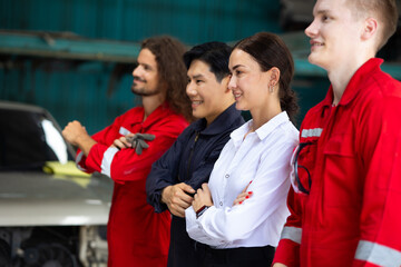 Professional team working at workplace. Unity and teamwork concept. Portrait engineer and mechanic repair factory worker and mechanic team together in factory workplace. Diverse man and woman