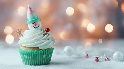  a frosted cupcake with a frosted snowman on top of it and a lady bug on top of it.