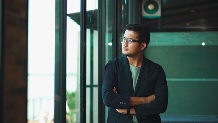 Handsome 38 years old gentle asian  man, wearing glasses, formal slick hairstyle,  in a modern...
